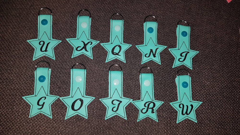 Schlüsselanhänger ITH Stern ABC 13x18